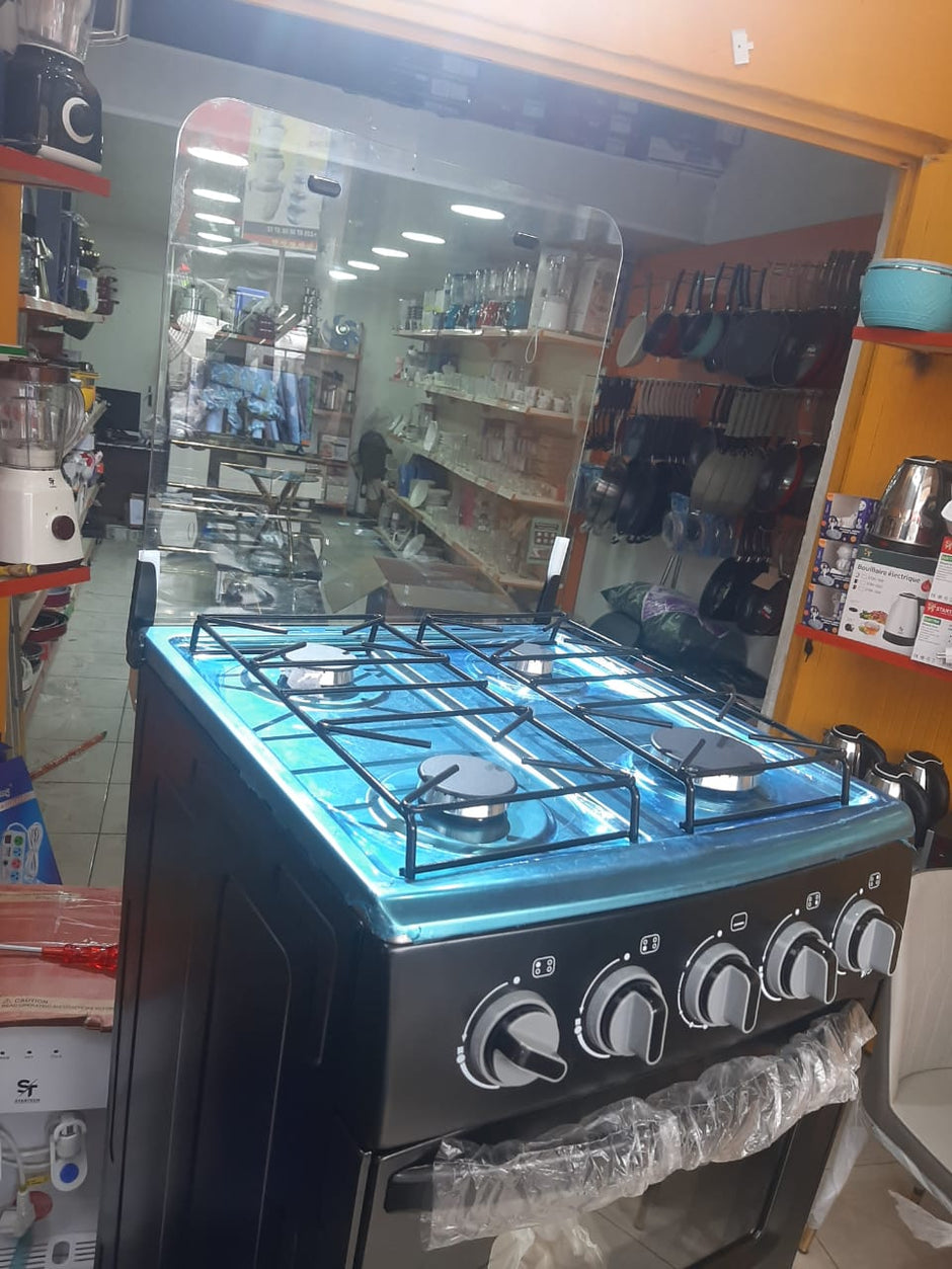 Gazinière Yücel 4 Feux Inox avec Mini-Four  vue de profil