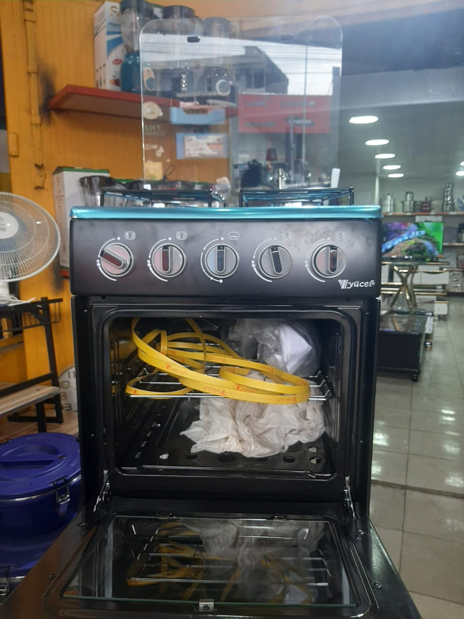Gazinière Yücel 4 Feux Inox avec Mini-Four vue de l'intérieur