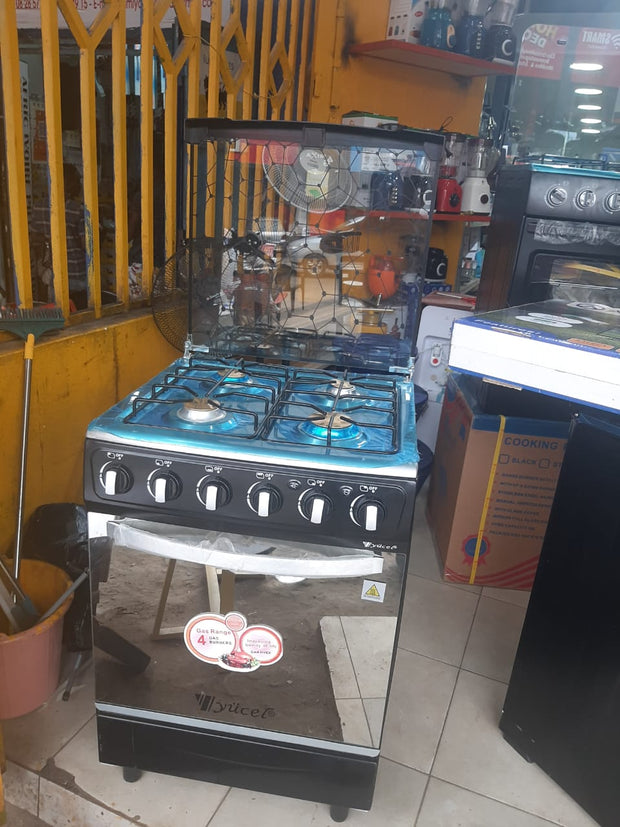 Grande gazinière Yucel 4 feux inox vue de pofil