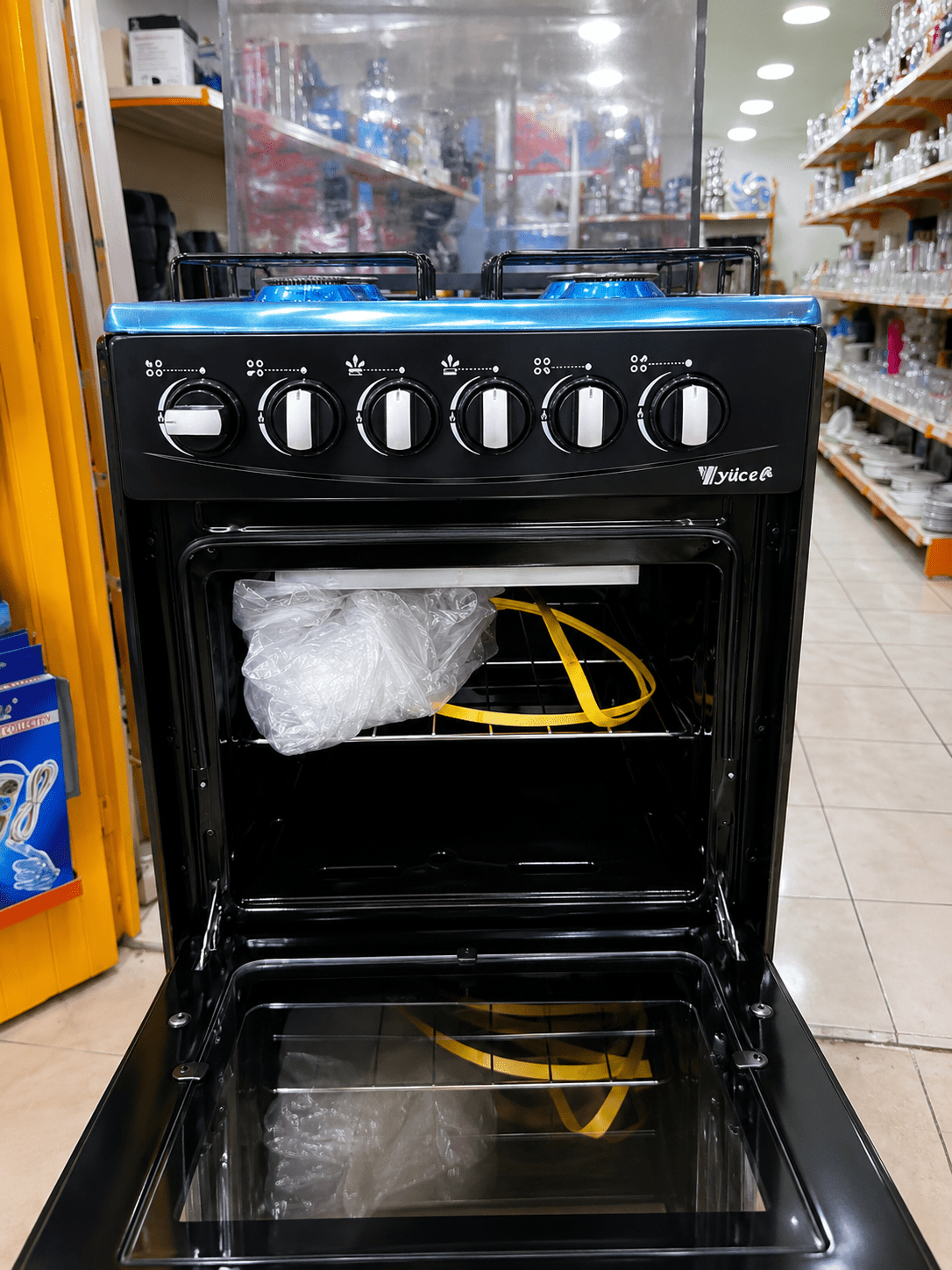 Gazinière Yücel 4 feux en inox avec mini-four - RAQO